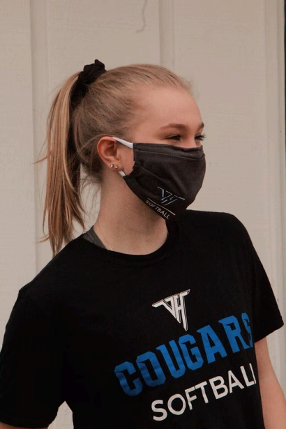 Volunteer selfie with donated masks in a vehicle